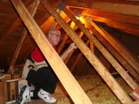 inspecting roof